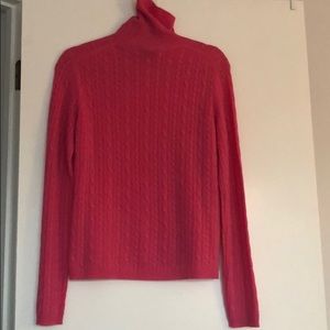 Pink cashmere turtleneck sweater